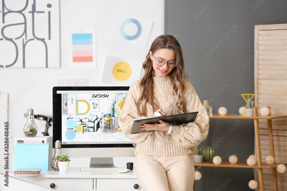 Portrait of female interior designer in office