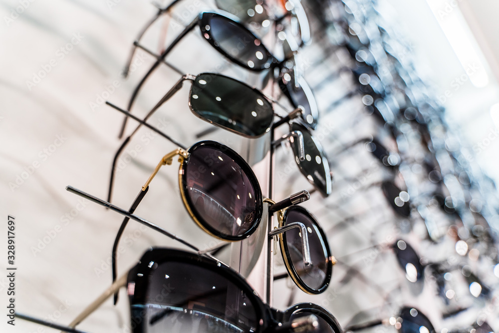 Raw of fashion elegance sunglasses in the store.