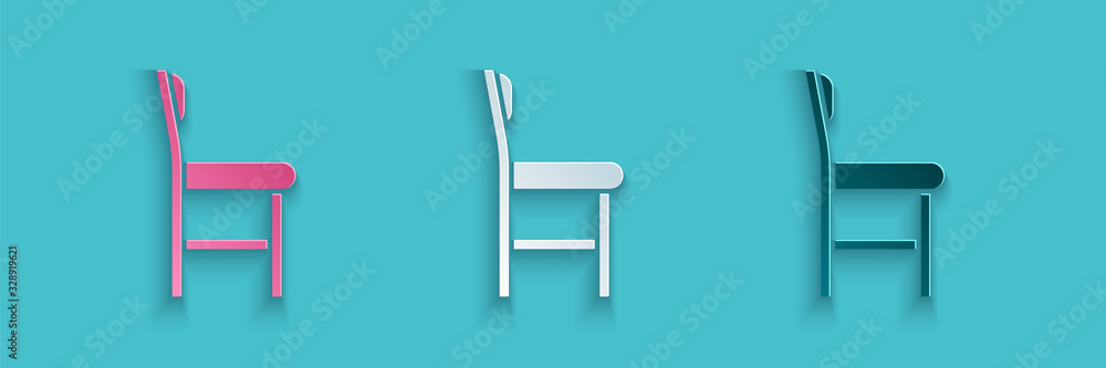 Paper cut Chair icon isolated on blue background. Paper art style. Vector Illustration