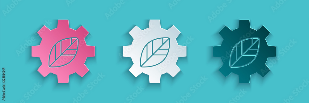 Paper cut Leaf plant ecology in gear machine icon isolated on blue background. Eco friendly technolo