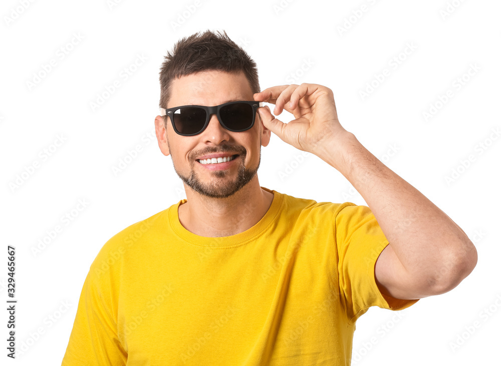 Handsome man with sunglasses on white background