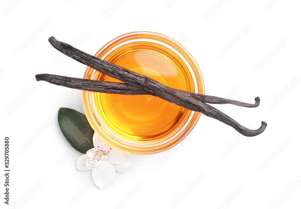 Bowl with vanilla extract on white background