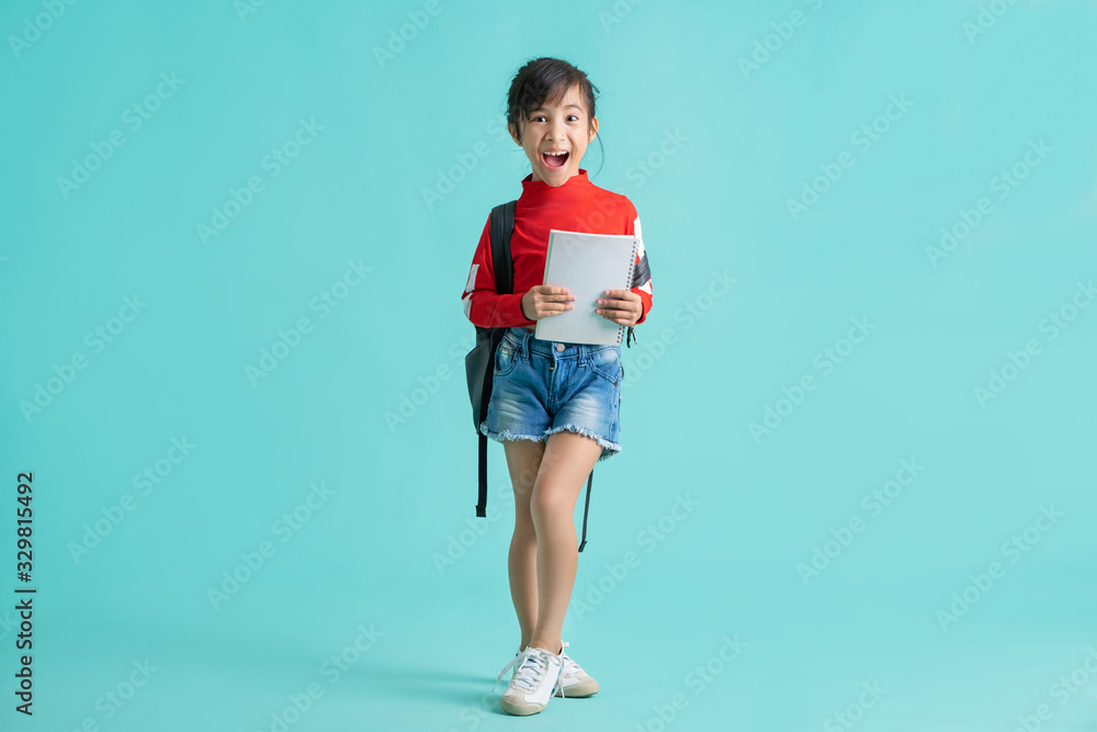 Asian schoolgirl she was surprised . In the background studio