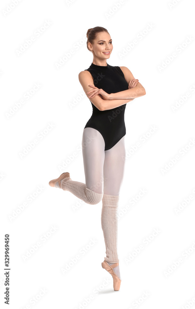 Beautiful young ballerina on white background