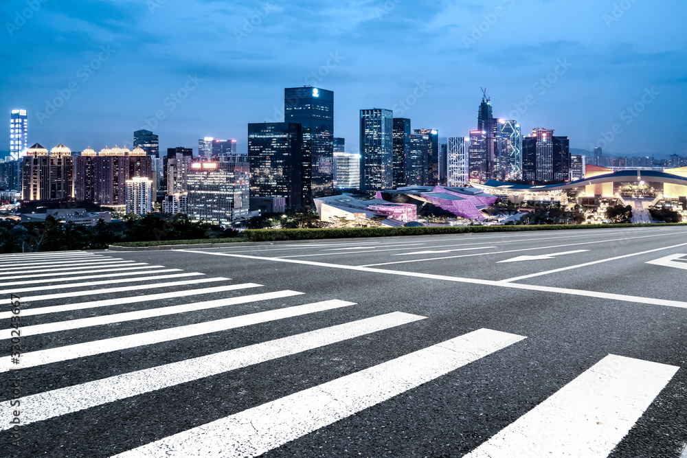 Road and skyline of urban architecture..