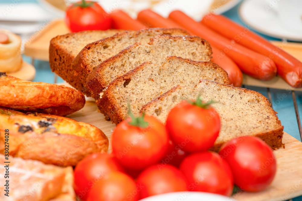 Breakfast Served in the morning with cereal bread, raisin bread, banana bread, sausage bread, chicke