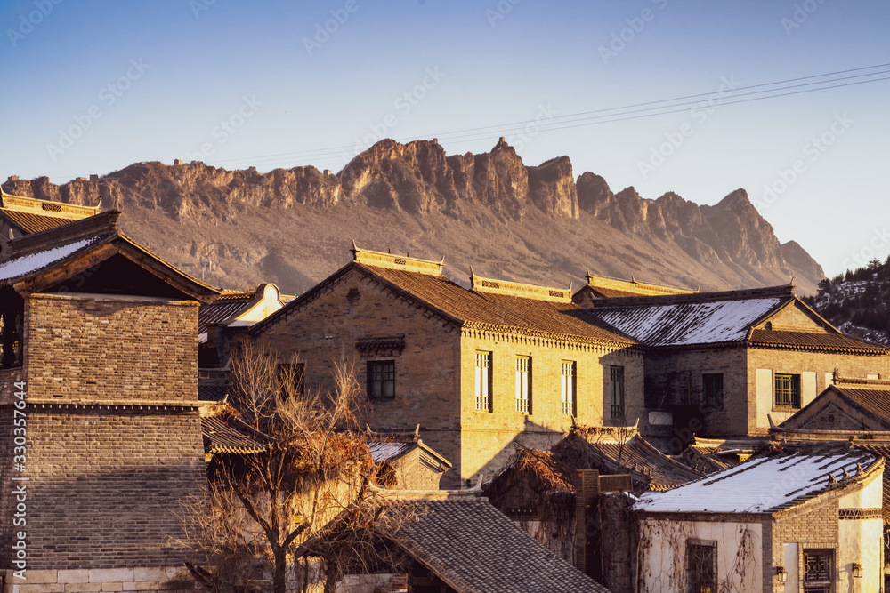 Beautiful sunlight shine on the walls of the old house at Gubei water town in Beijing,China.