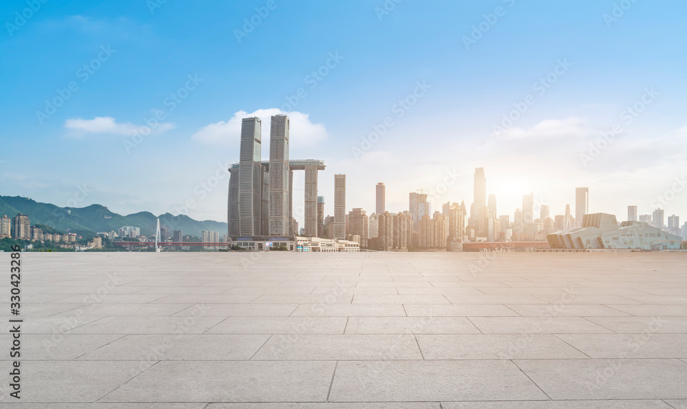 The architectural landscape and urban skyline of the square floor tile with empty foreground..