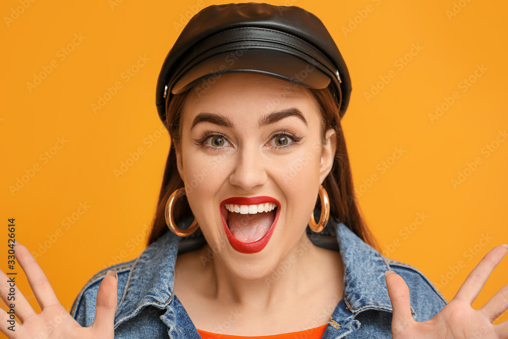 Happy young woman on color background