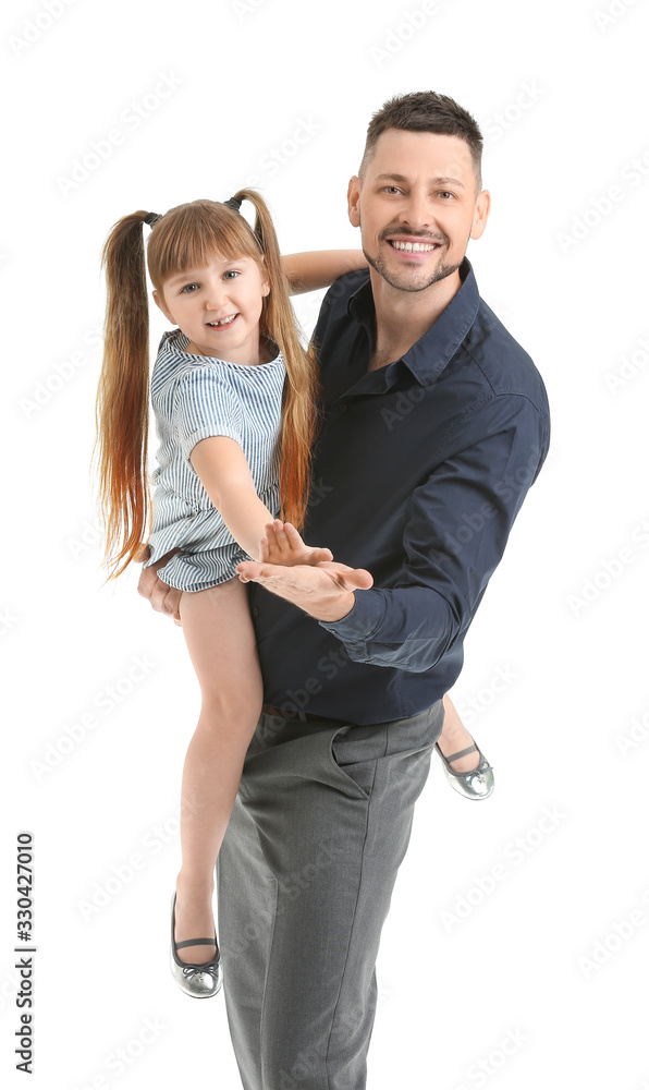 Father and his little daughter dancing against white background