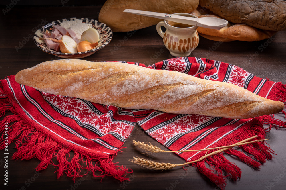 Bread isolated on rustic wooden table 