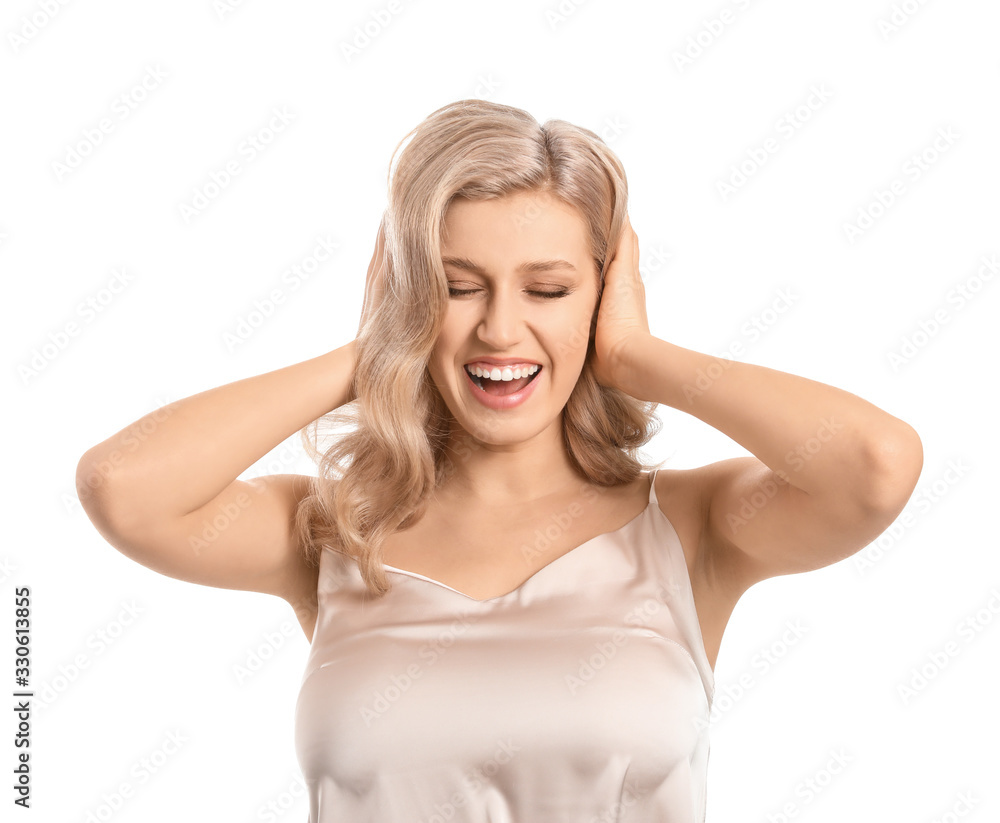 Young blonde with beautiful hair on white background