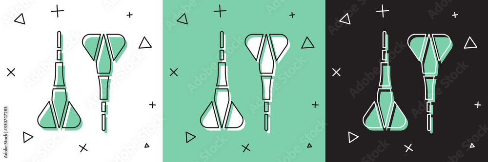 将飞镖箭头图标隔离在白色和绿色黑色背景上。矢量插图