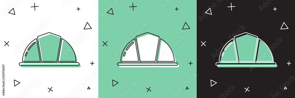 将工人安全帽图标隔离在白色和绿色黑色背景上。矢量插图