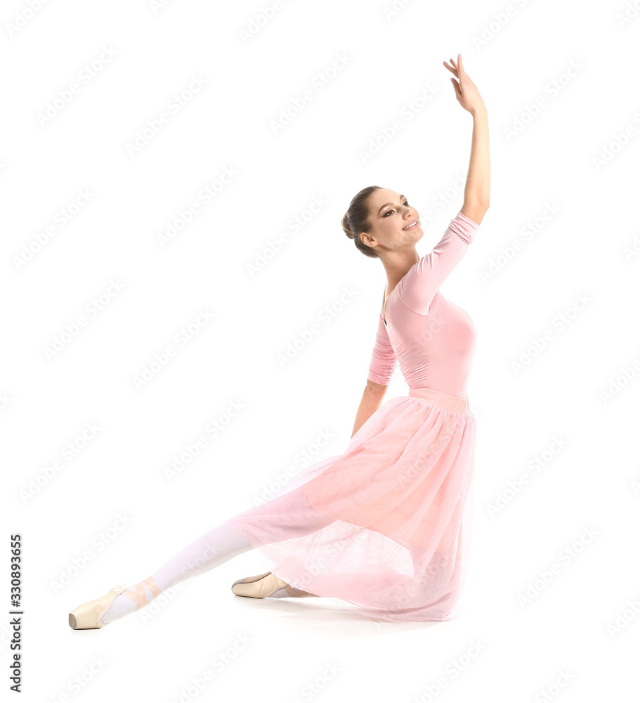 Beautiful young ballerina on white background