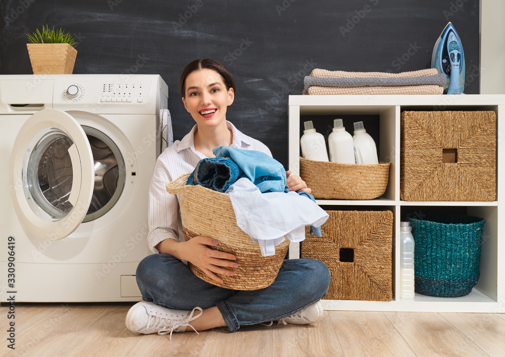 woman is doing laundry