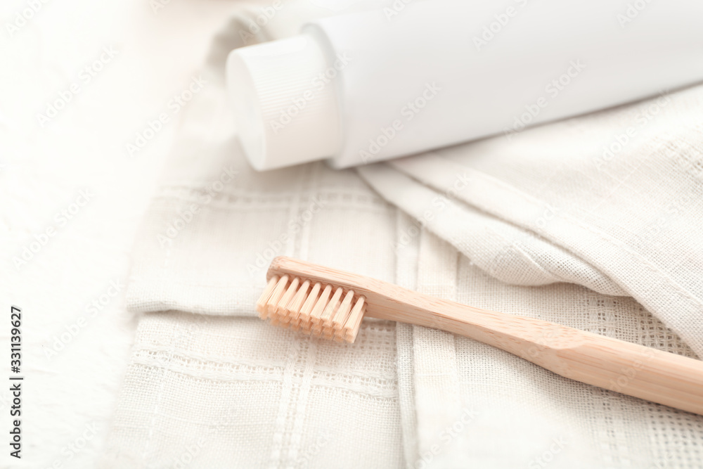 Tooth brush and paste on table