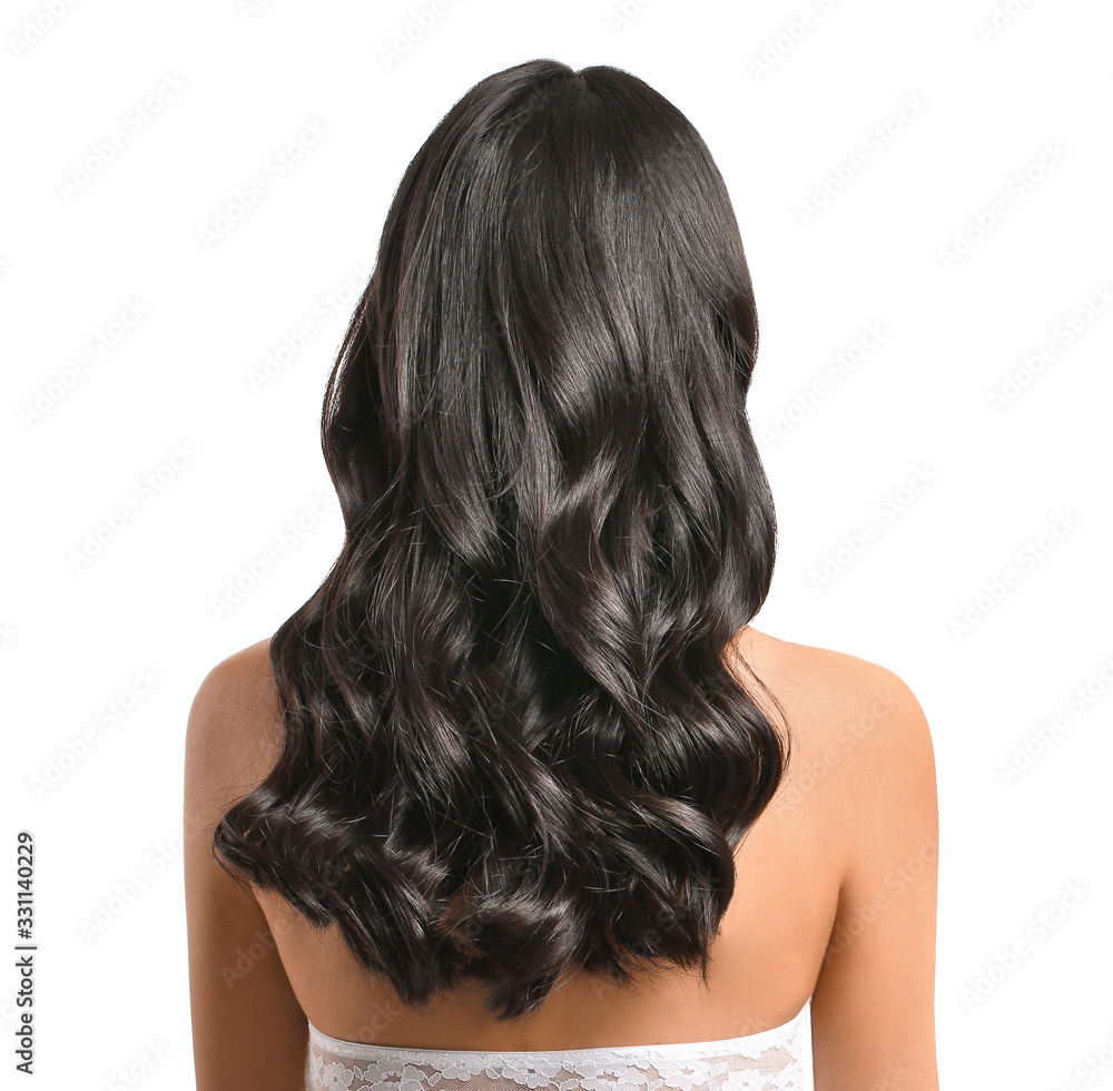 Young Asian woman with beautiful long hair on white background