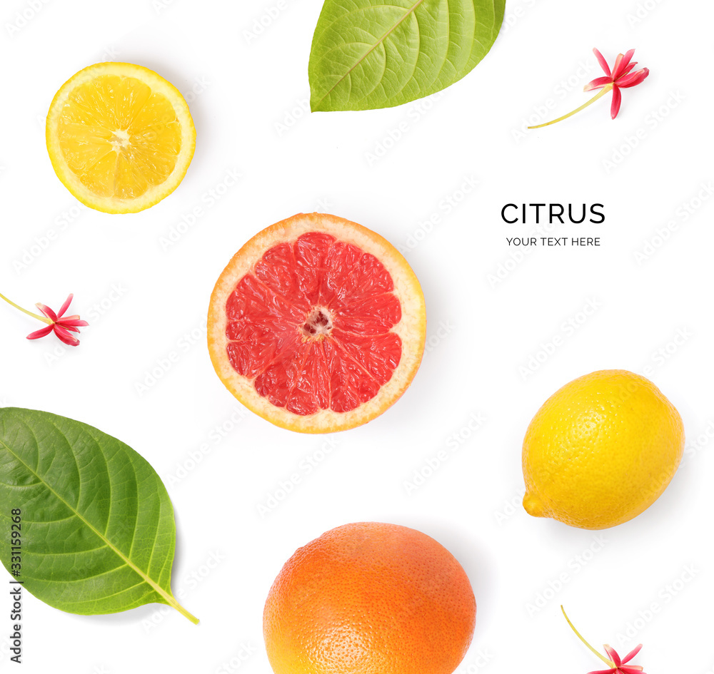 Creative layout made of grapefruit, lemon on the white background. Flat lay. Food concept. Macro  co