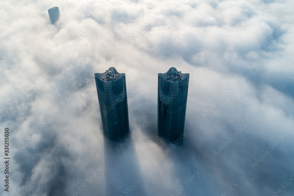 A City shrouded in fog in the morning, Nanchang, China 