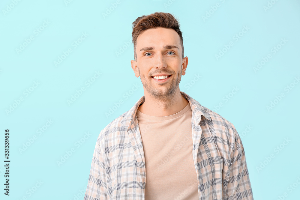 Happy man on color background