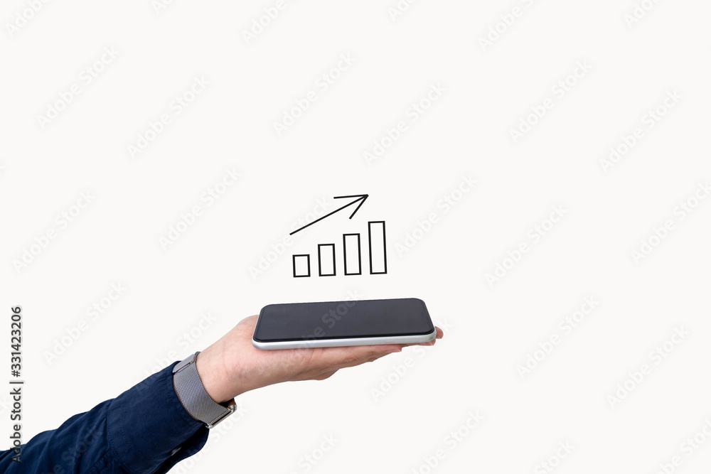 Business people put mobile phones in the palm of the hand and have a logo, graph showing the company