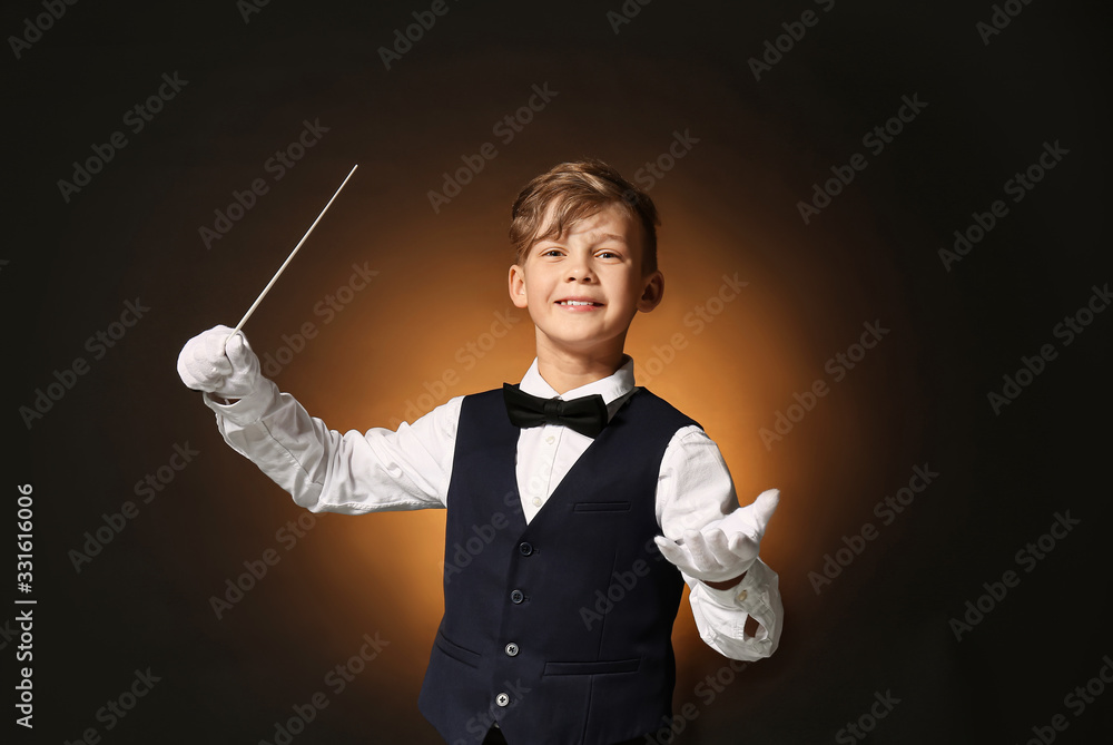 Little conductor on dark background