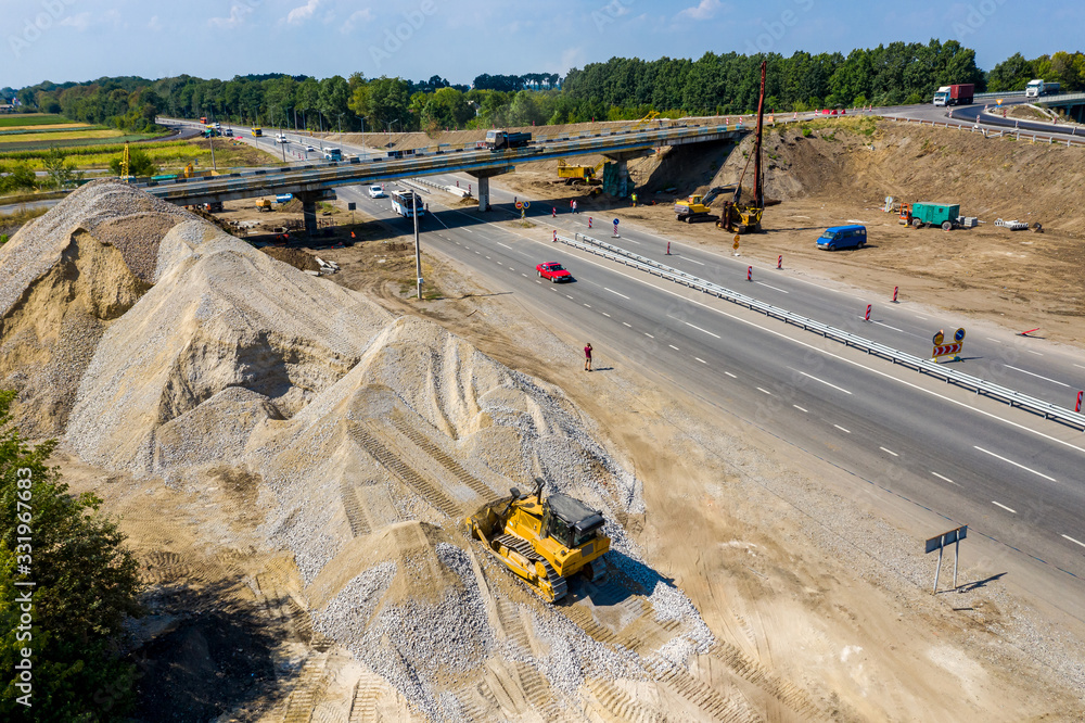 Aerial view of heavy machinery for crushing and collecting stone, limestone, sand and gravel, materi