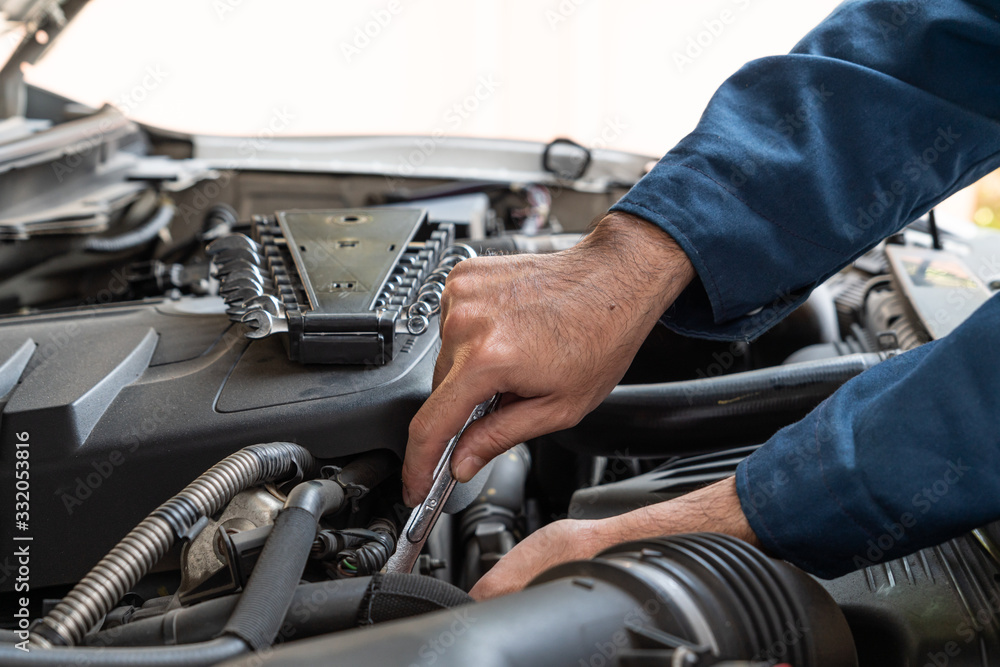 Professional mechanic providing car repair service