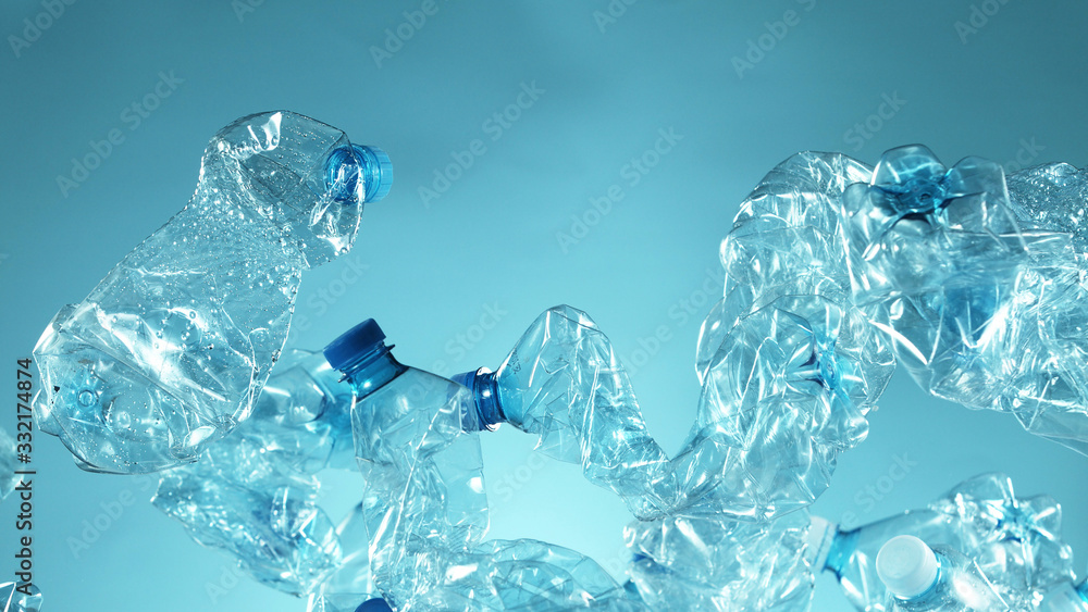 Pile of flying empty plastic bottles