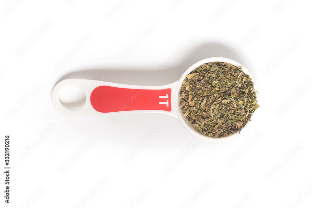 Dried Oregano into a Tablespoon.