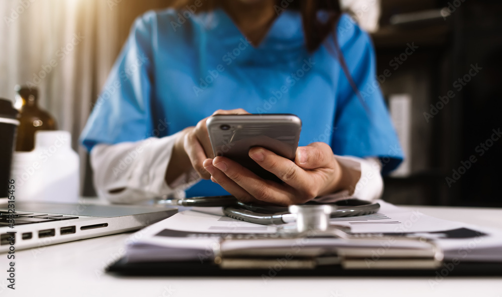 Medicine doctor hand working with modern smartphone computer interface as medical network concept