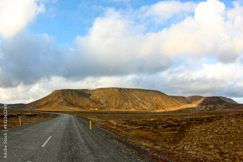 asphalt road and mountains with nature landscape in Iceland