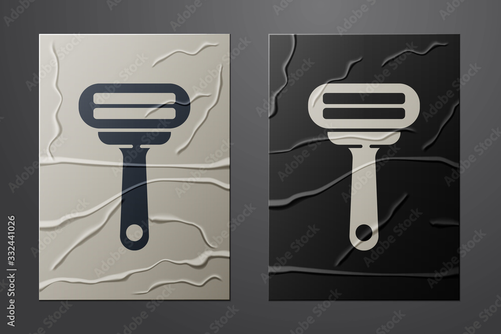 White Shaving razor icon isolated on crumpled paper background. Paper art style. Vector Illustration