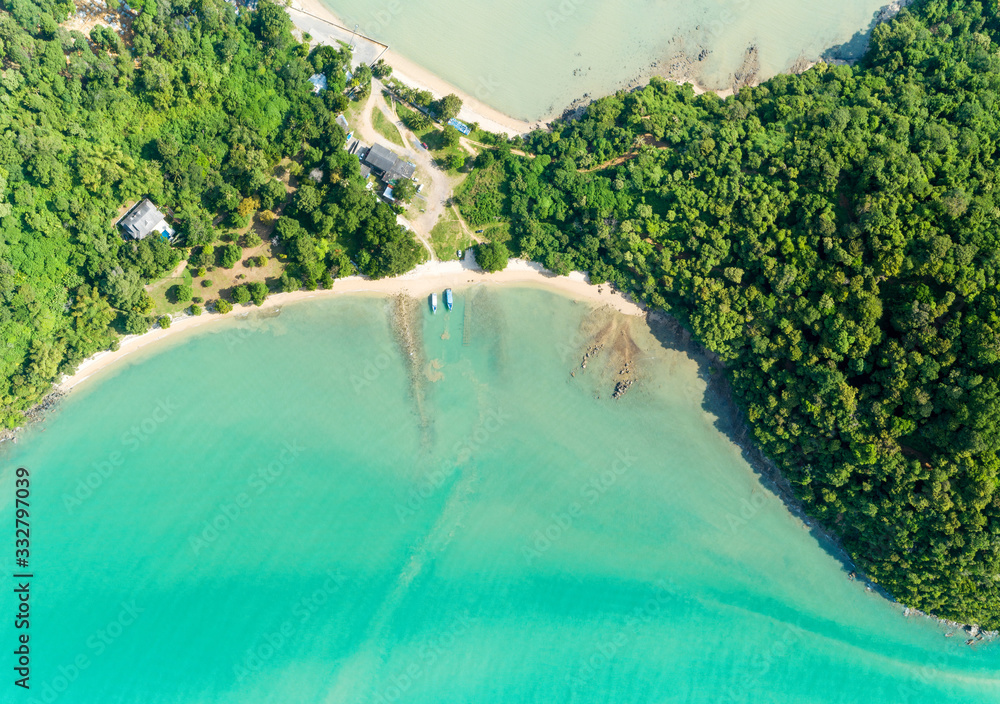 Drone aerial view shot of Tropical sea with beautiful seashore island in Phuket Thailand.