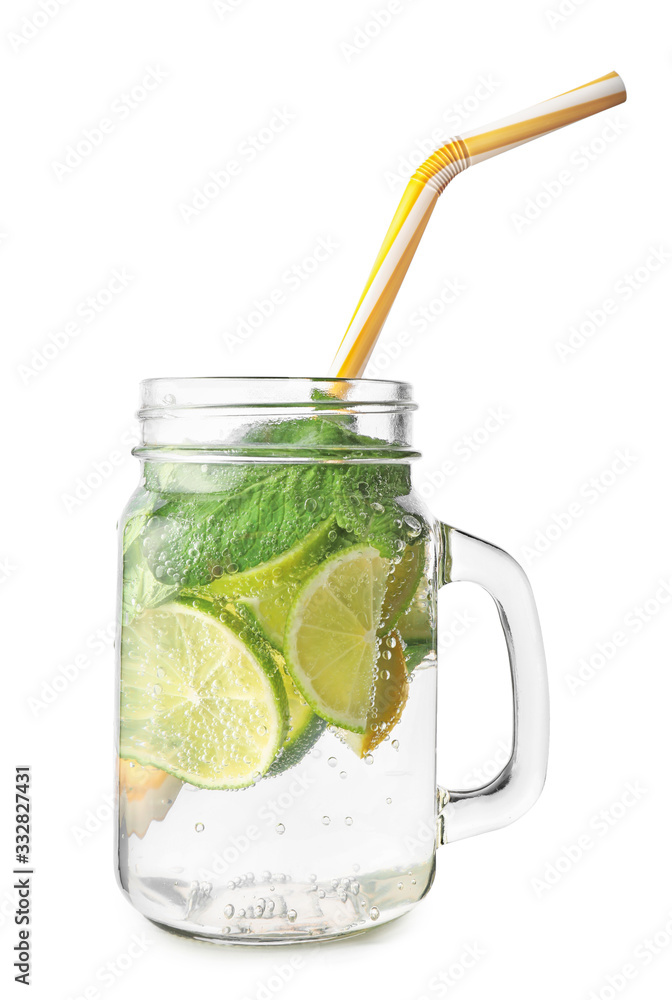 Mason jar of fresh lime lemonade on white background