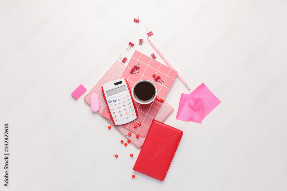 Stationery with cup of coffee on white background