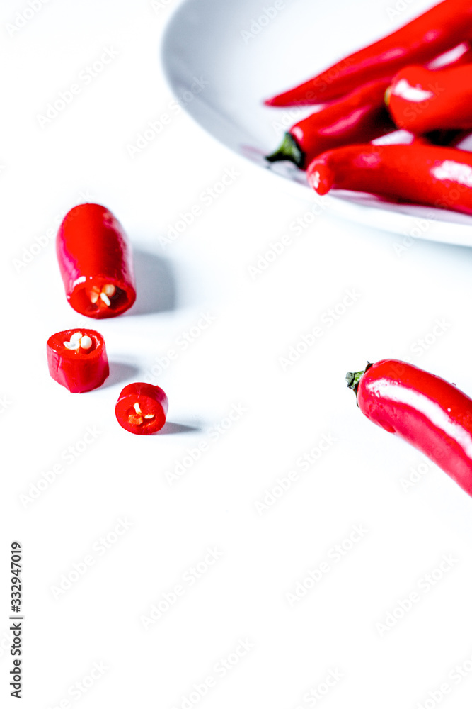 hot food with red chili in plate on white table background mock up