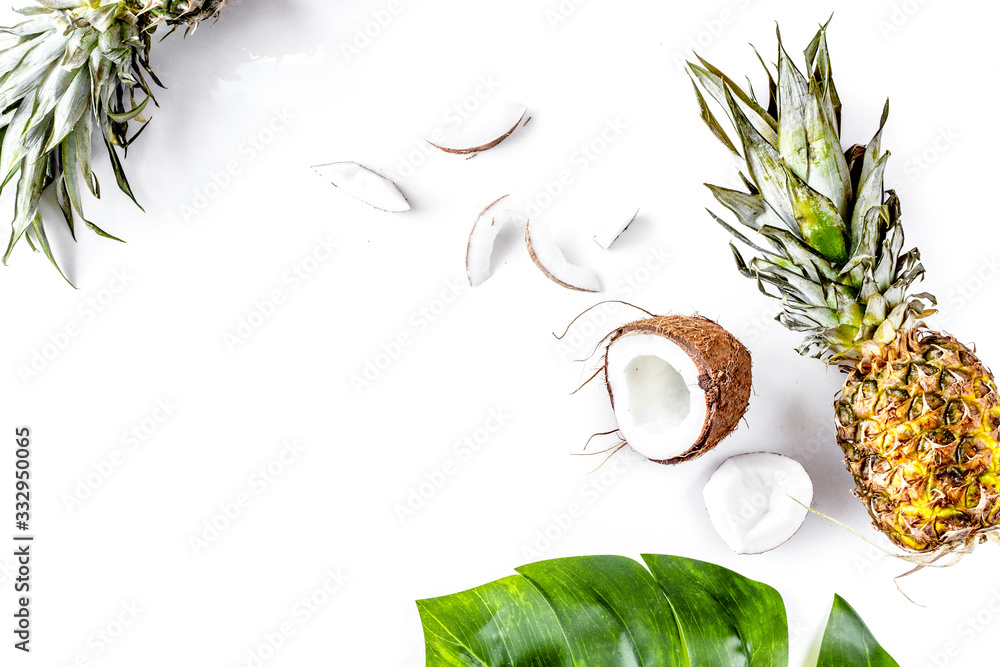 sliced exotic fruits on white background top view space for text