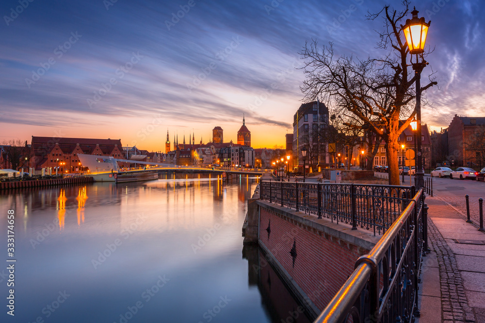 Gdansk with beautiful old town over Motlawa river at sunset, Poland.