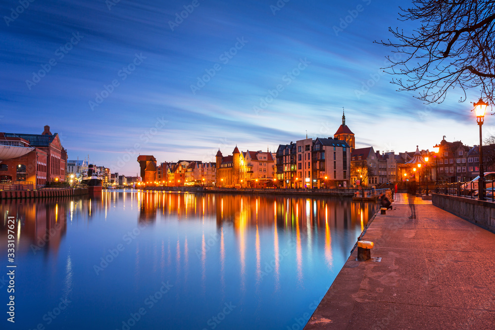 Gdansk with beautiful old town over Motlawa river at dusk, Poland.