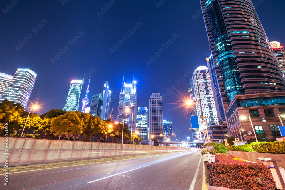 Night view of architectural street in Lujiazui Financial District, Shanghai..