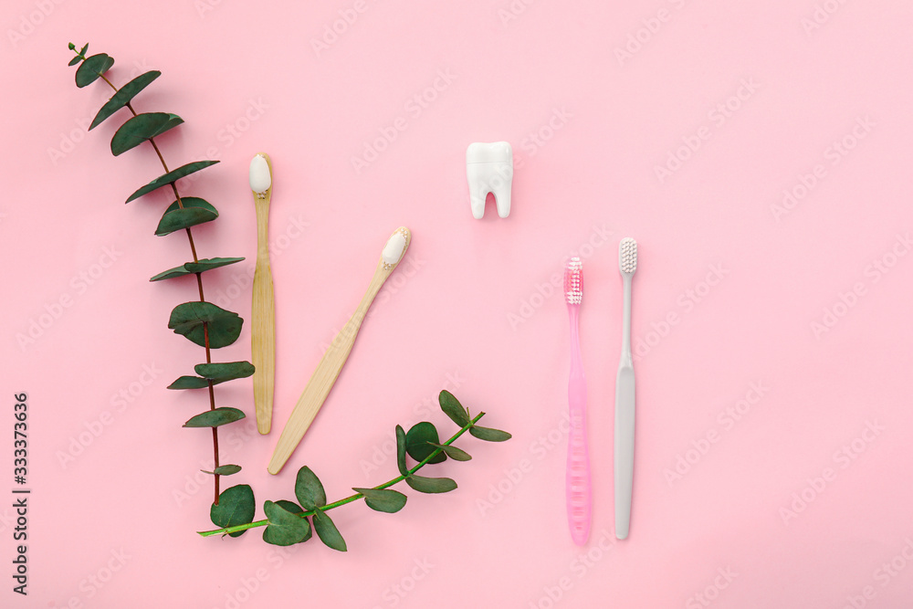 Composition with tooth brushes on color background