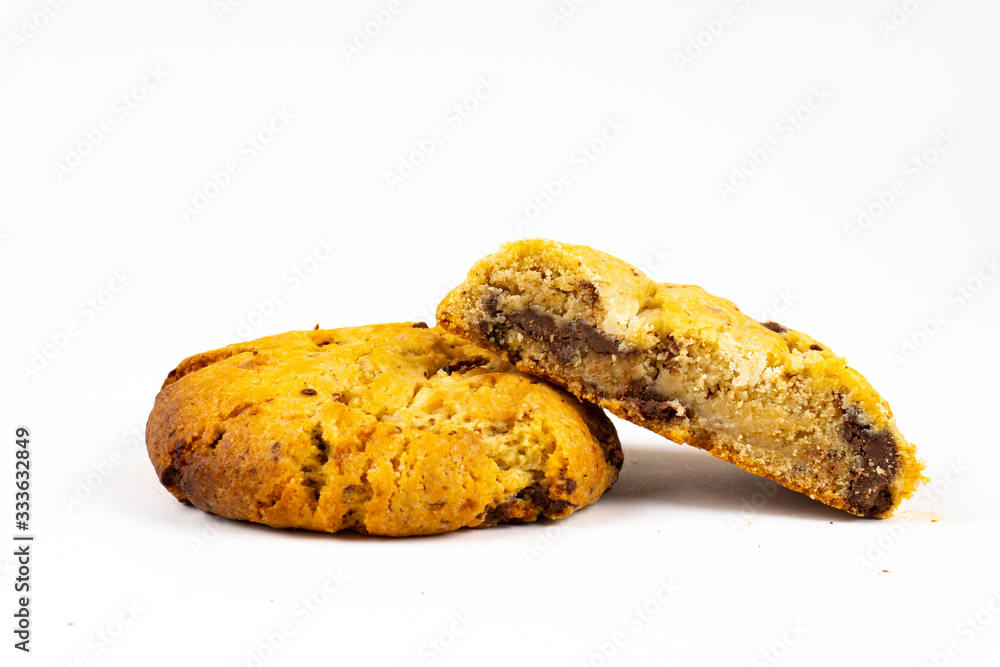 A cookie cake with chocolate on white background with copy space