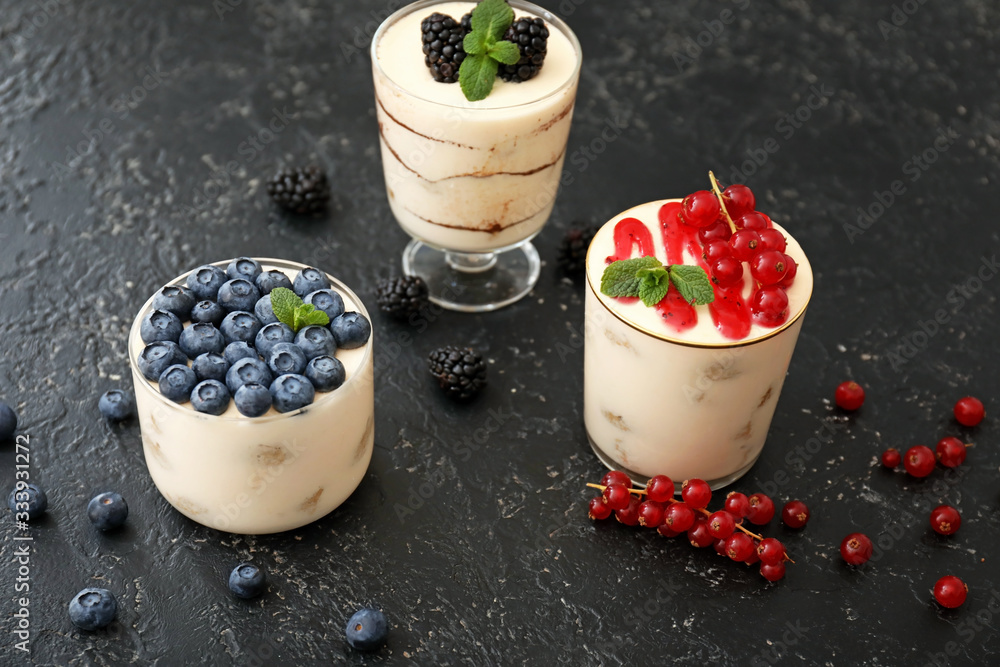 Tasty tiramisu on dark background