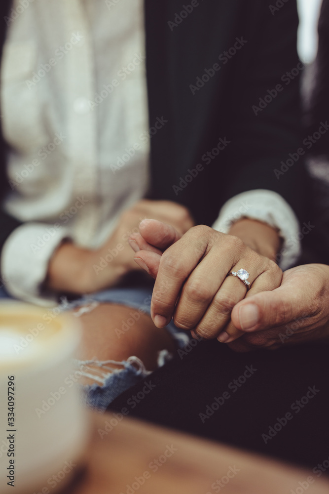 Loving couple sitting at coffee shop