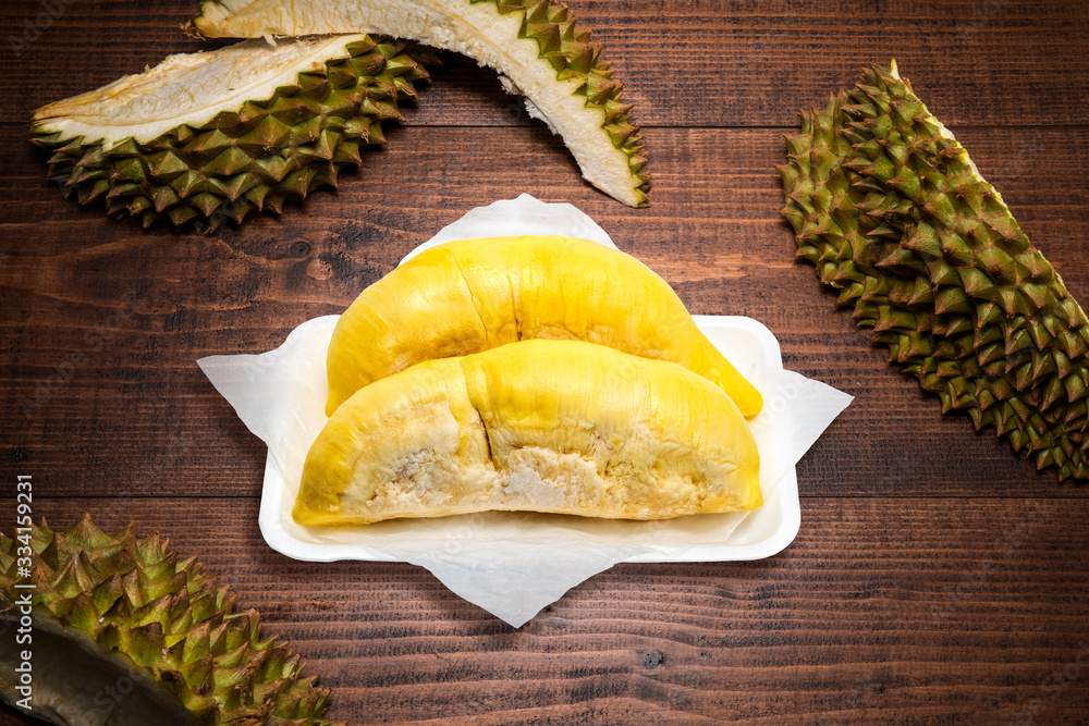 Durian the King of fruits, Durian fruit  on wooden background.durian fruit with delicious golden yel