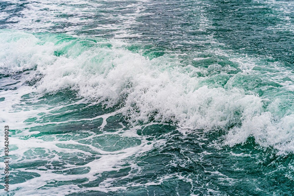 Seething atlantic sea water with foam, jet, stream Cape Cod