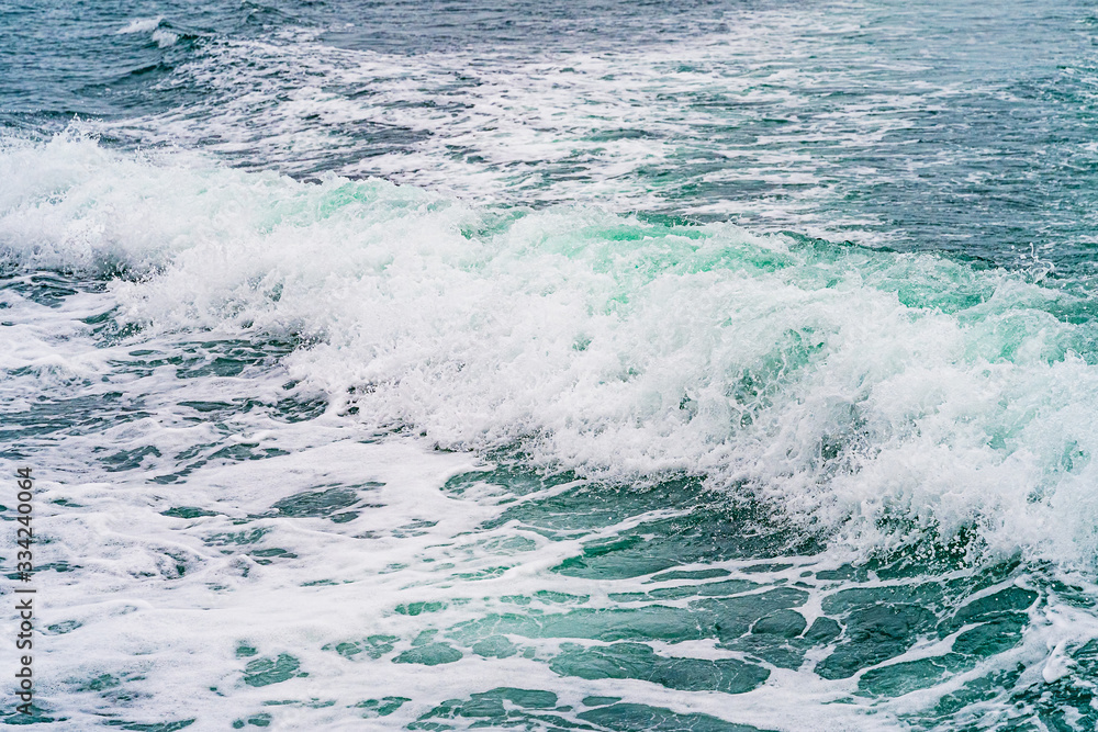 Seething atlantic sea water with foam, jet, stream Cape Cod