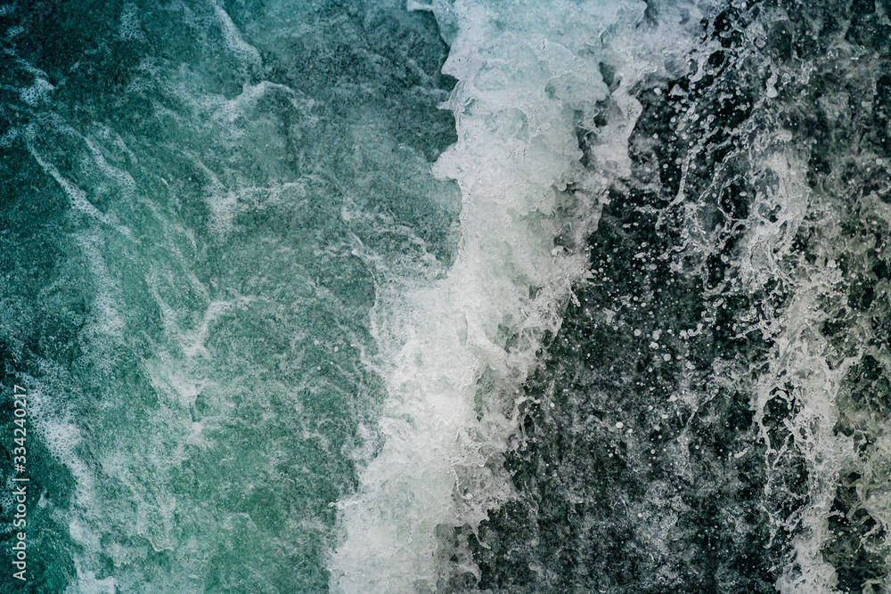 Seething atlantic sea water with foam, jet, stream Cape Cod